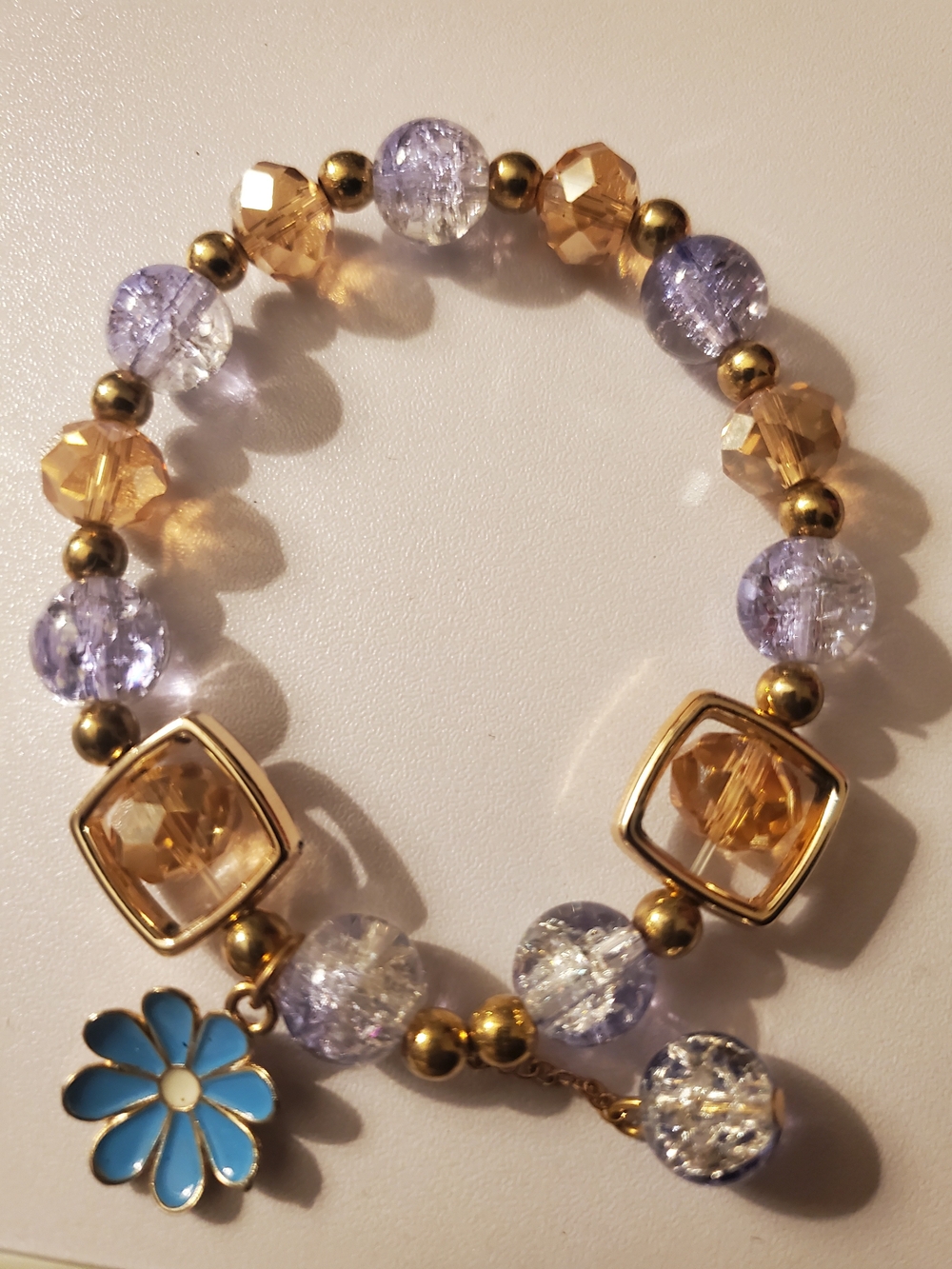 Gold, Lavender & Champagne Beaded Stretch Bracelet with Blue Flower Charm (new)